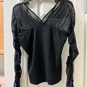 Black Anthropologie  size small. Sheer sleeve top nwt tags